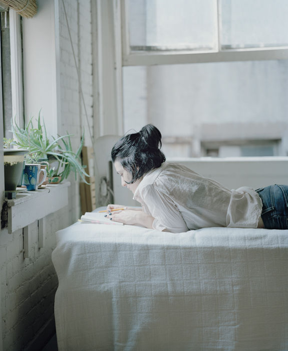 Carrie Schneider, Vicky reading Gloria Fuertes (Historia de Gloria: Amor, Humor and Desamor (Letras Hispanicas), 1983) from the series Reading Women (2012-2014), 2014