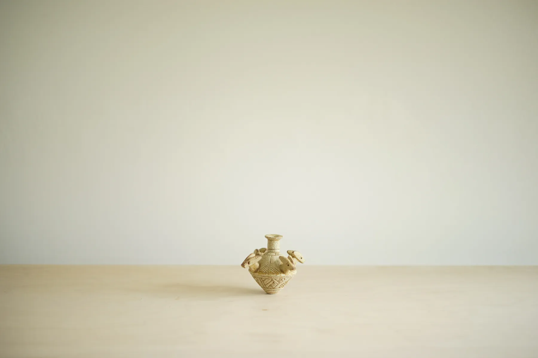 Ian Godfrey, Ochre Bottle with Four Foxes, c. 1970s