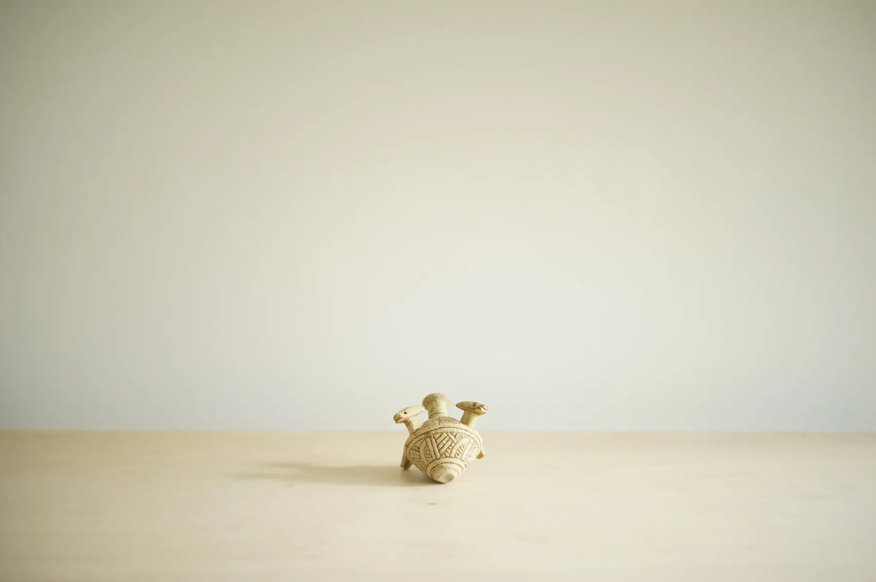 Ian Godfrey, Ochre Bottle with Four Foxes, c. 1970s