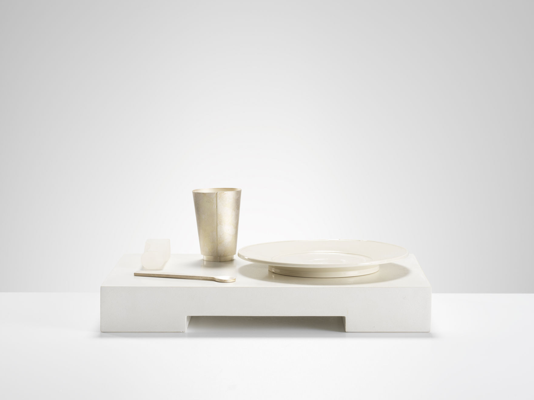 Julian Stair & Simone ten Hompel, Beaker, plate, spoon and object on a rectangular white ground, 2016