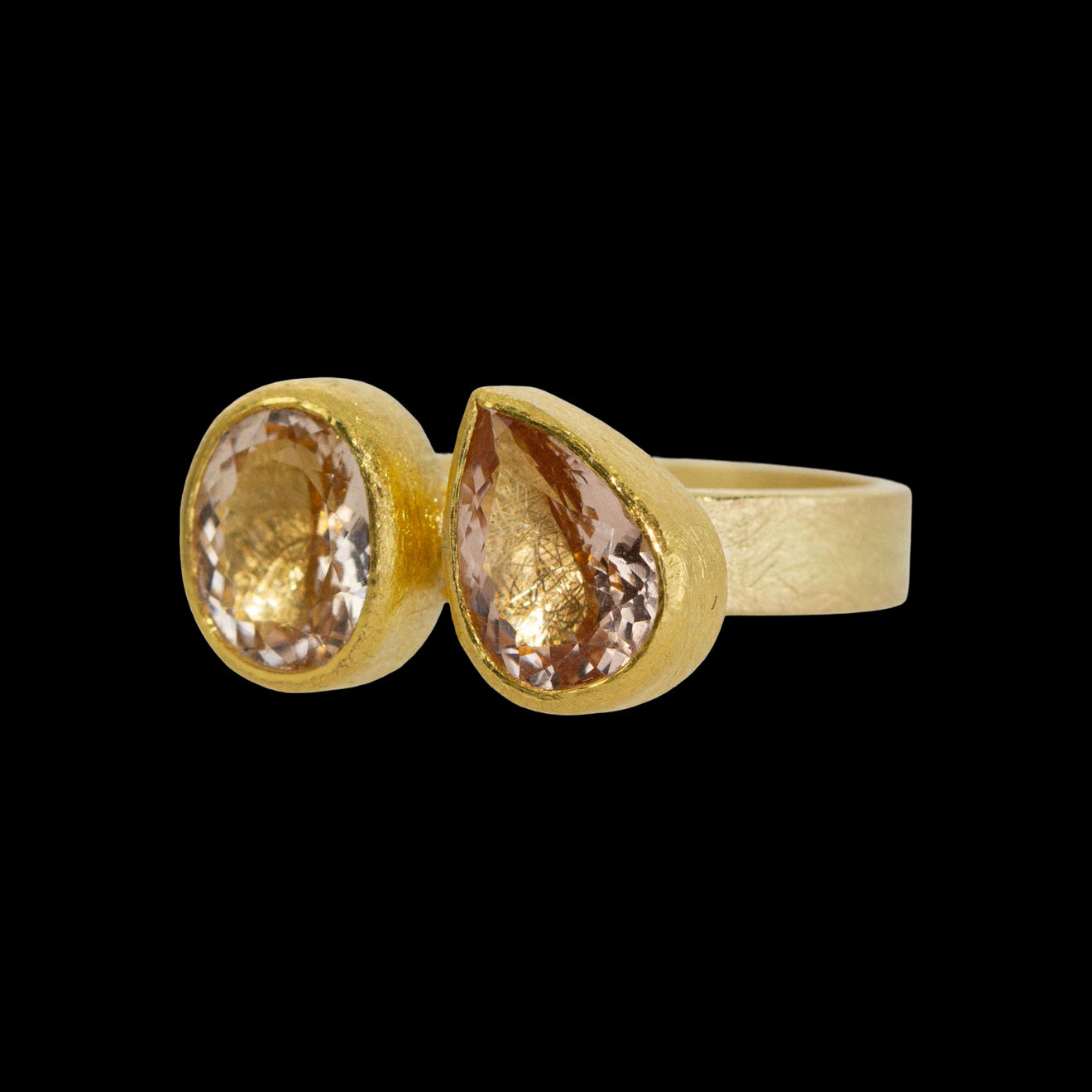 22k yellow gold ring with bezel set faceted oval and teardrop morganite by Fringe Gallery studio jeweler Petra Class