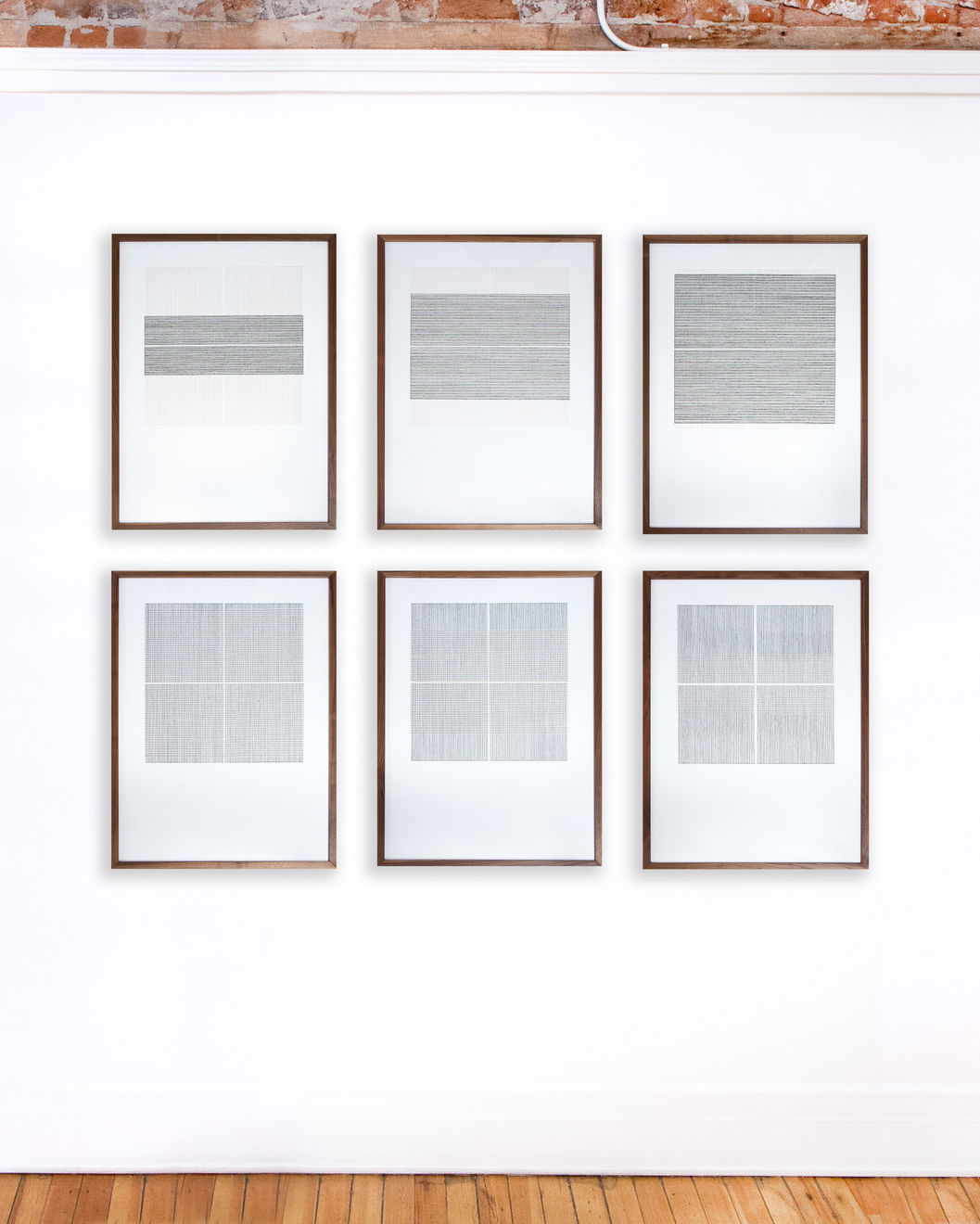 Series of framed black and white thread on paper works by Fringe Gallery artist Rebecca Messier