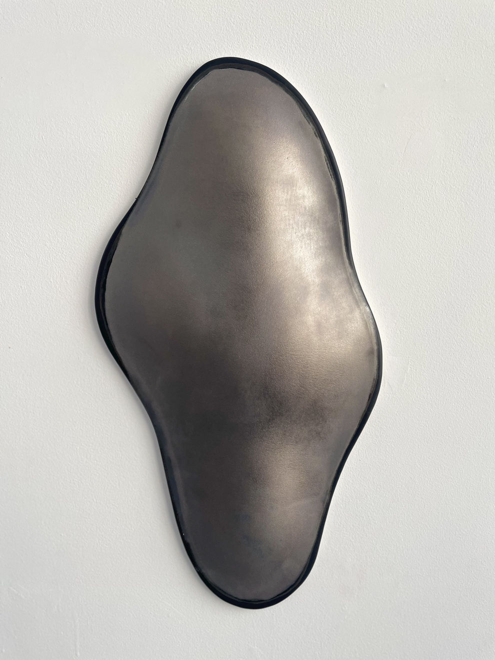 Glazed gray ceramic sculpture by Fringe Gallery artist Angela Okajima-Kempinas