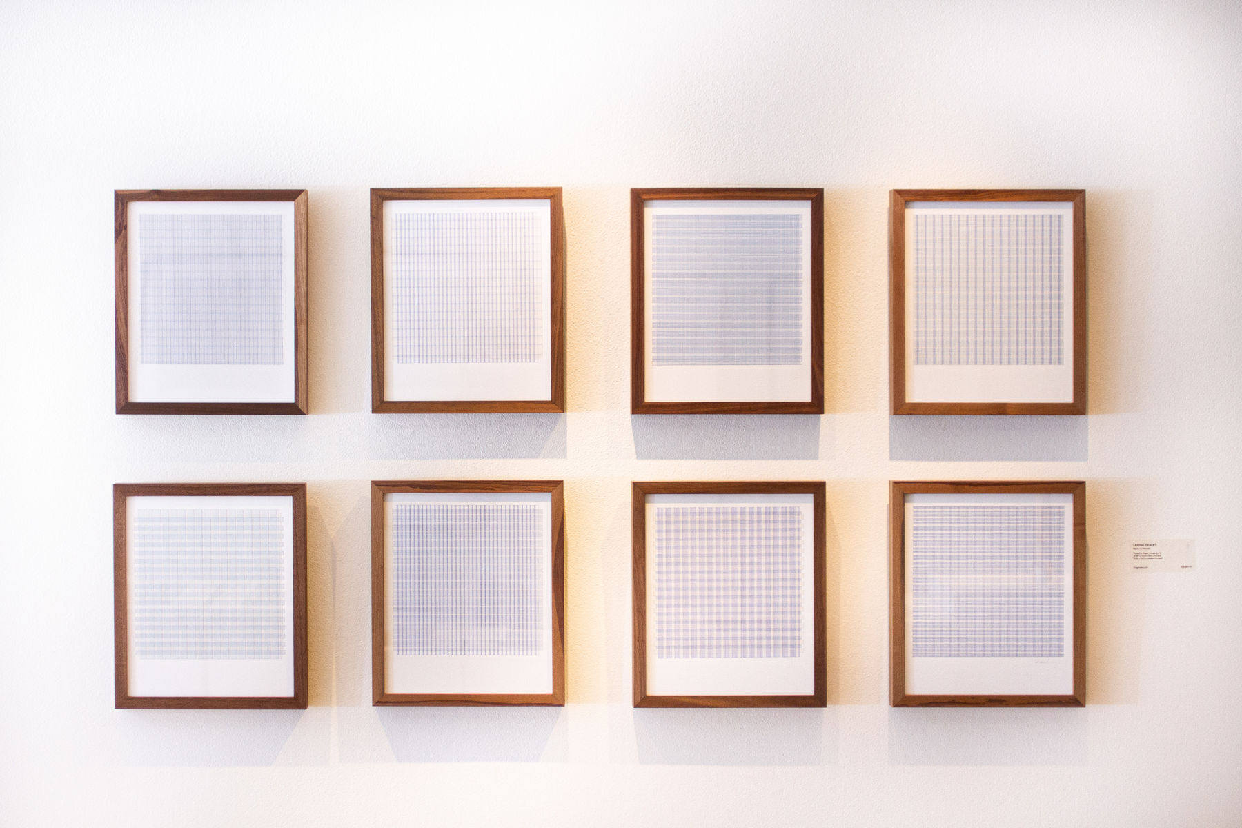 Series of framed blue thread on paper works by Fringe Gallery artist Rebecca Messier