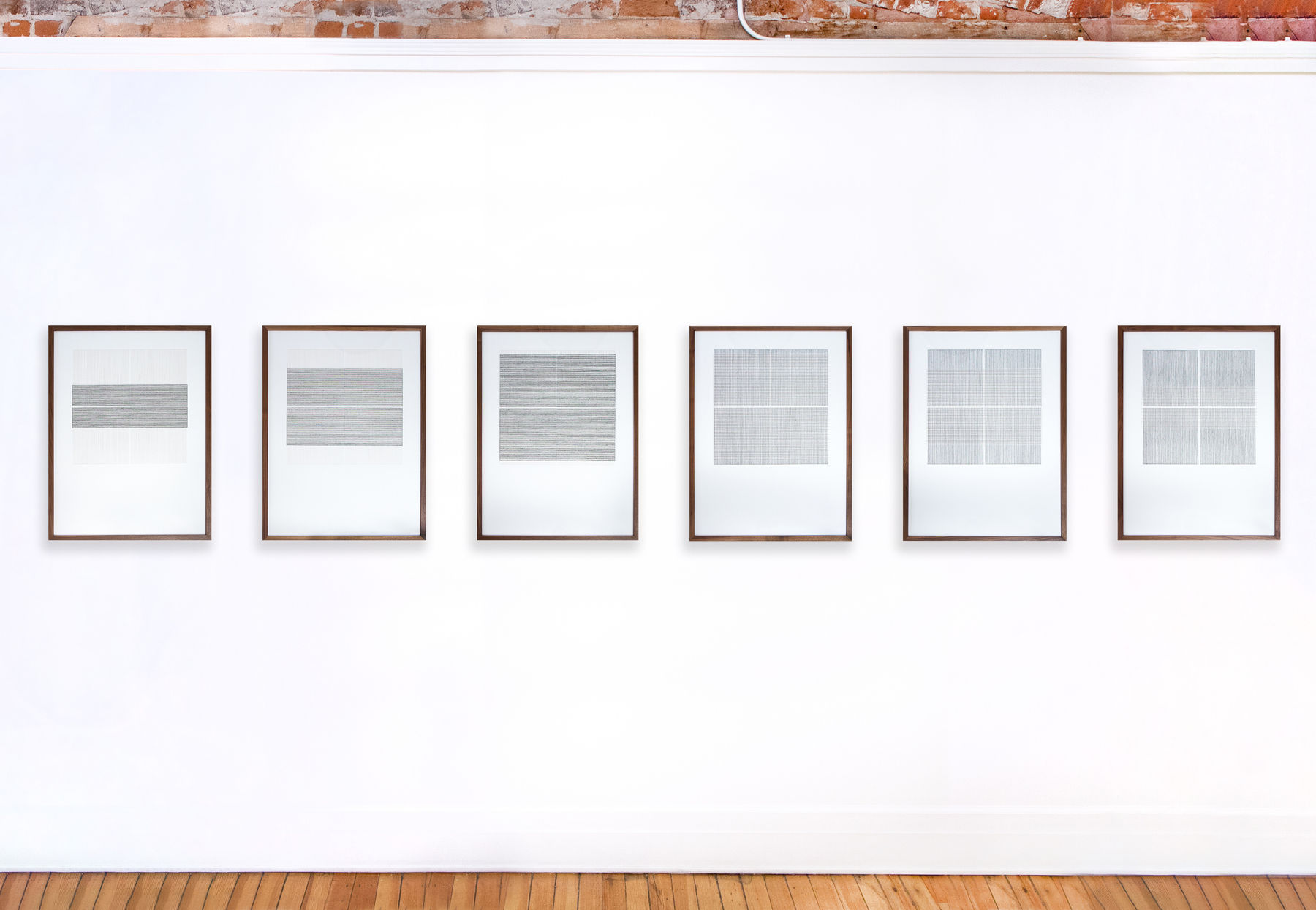 Series of framed black and white thread on paper works by Fringe Gallery artist Rebecca Messier