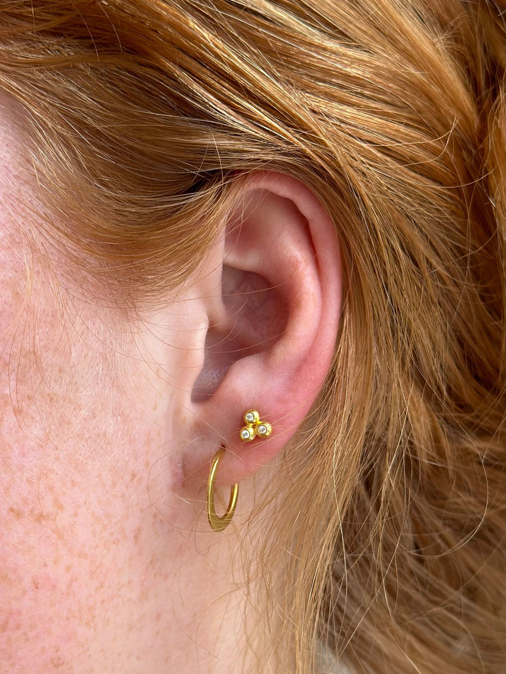 22k yellow gold triple diamond studs by Fringe Gallery studio jeweler Nanci Modica