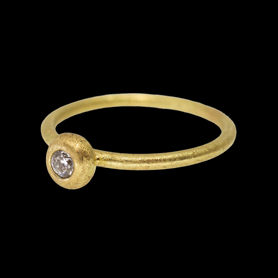 22k and 18k yellow gold ring with bubble set white diamond by Fringe Gallery studio jeweler Petra Class