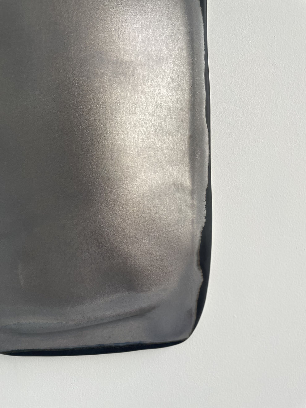 Glazed gray ceramic sculpture by Fringe Gallery artist Angela Okajima-Kempinas