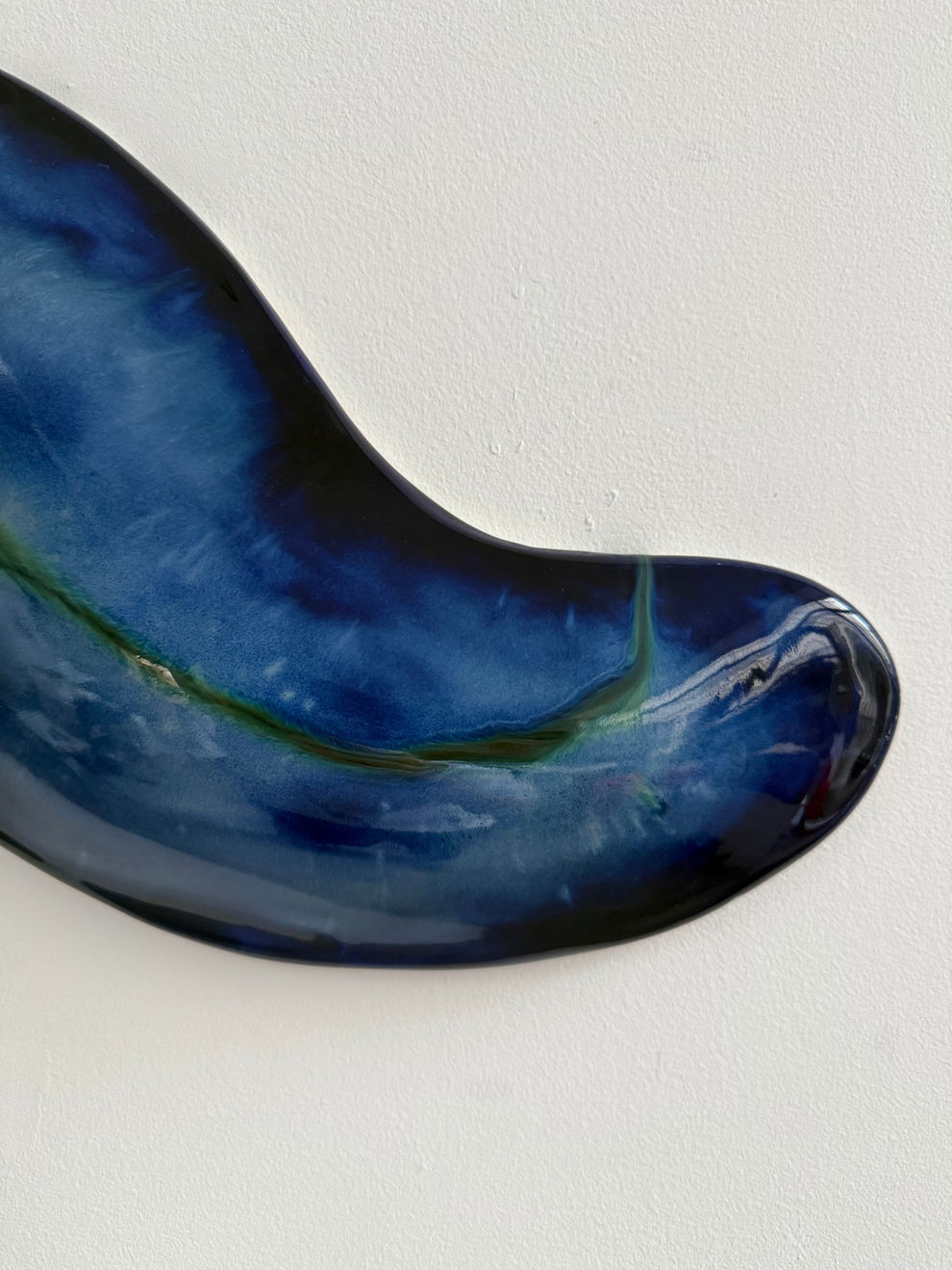 Glazed ceramic blue sculpture by Fringe Gallery artist Angela Okajima-Kempinas