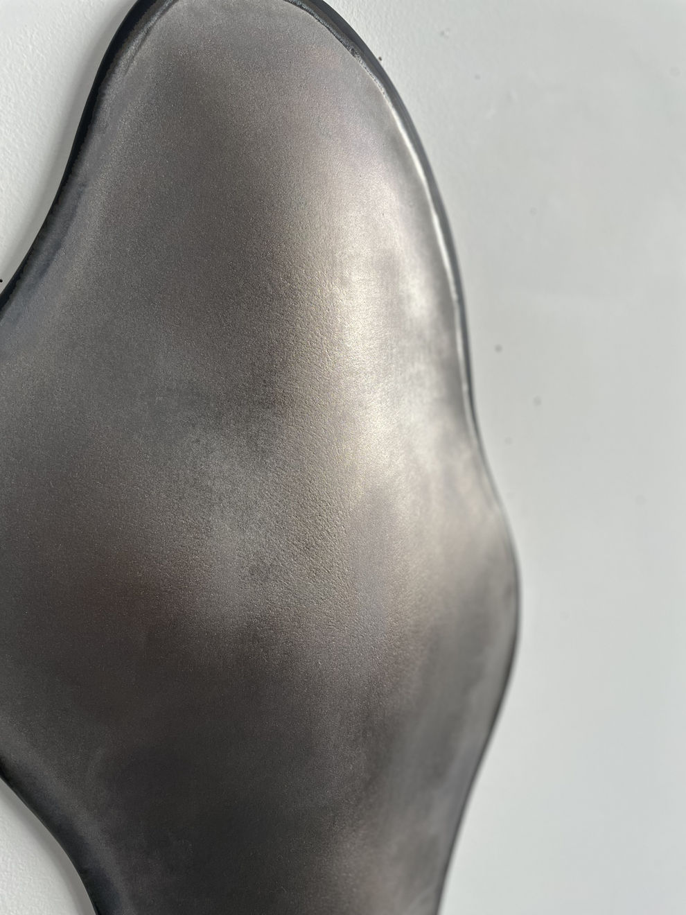 Glazed gray ceramic sculpture by Fringe Gallery artist Angela Okajima-Kempinas