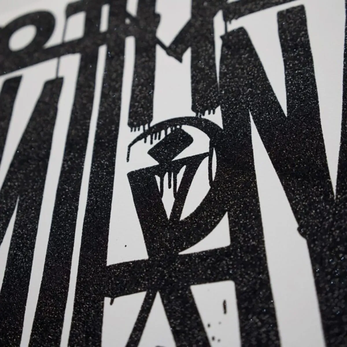 Retna print with white background and black diamond dust calligraphy