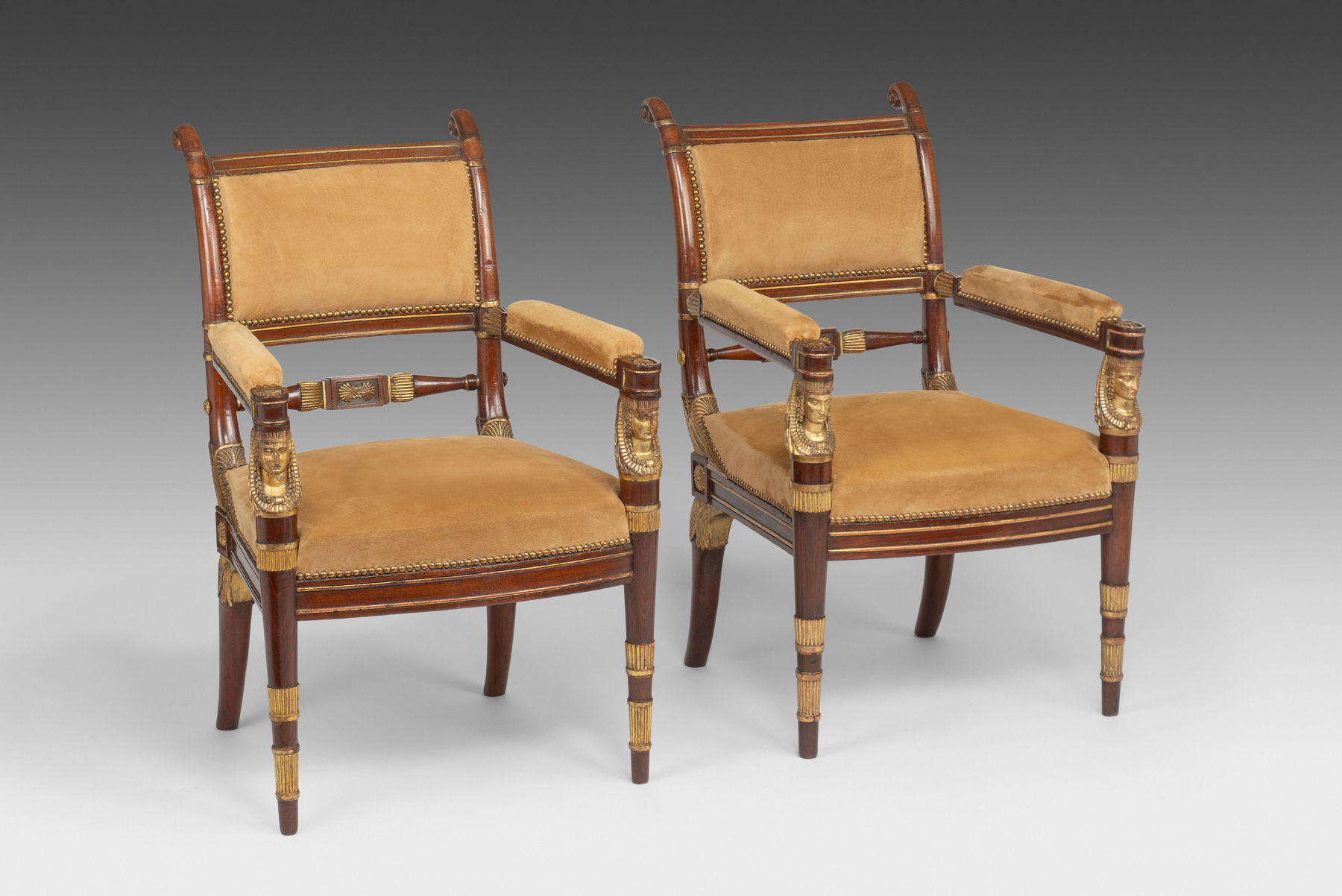 Pair of Regency Mahogany and Parcel Gilt Arm Chairs attributed to Morel & Hughes