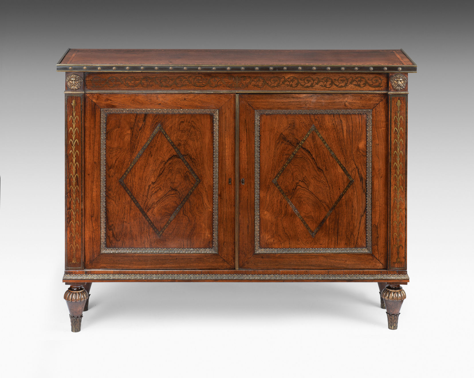 Pair of Regency Rosewood and Cut Brass Inlaid Side Cabinets attributed to George Oakley