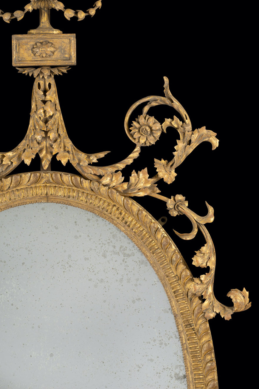 Coulborn George III Carved Giltwood Oval Mirror after designs by Robert Adam
