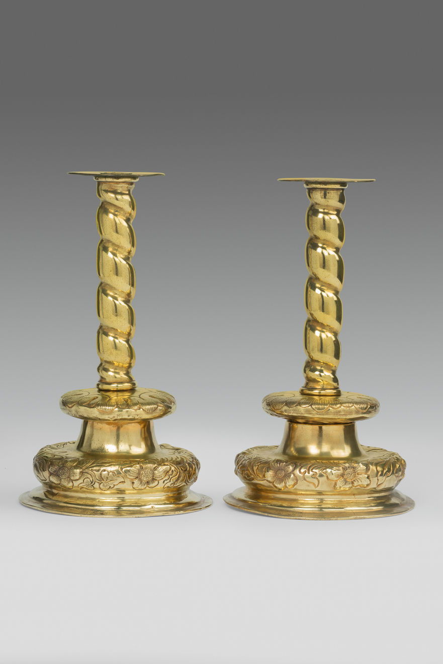 Pair of 17th Century Brass Repousse Candlesticks