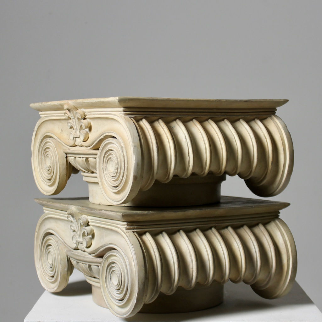 Pair Of Coade Stone Ionic Capitals ( sold )