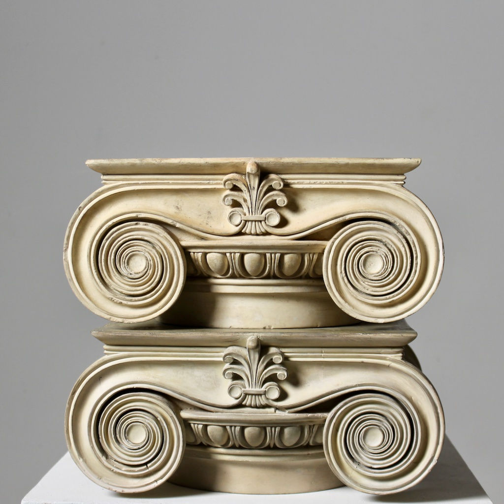 Pair Of Coade Stone Ionic Capitals ( sold )