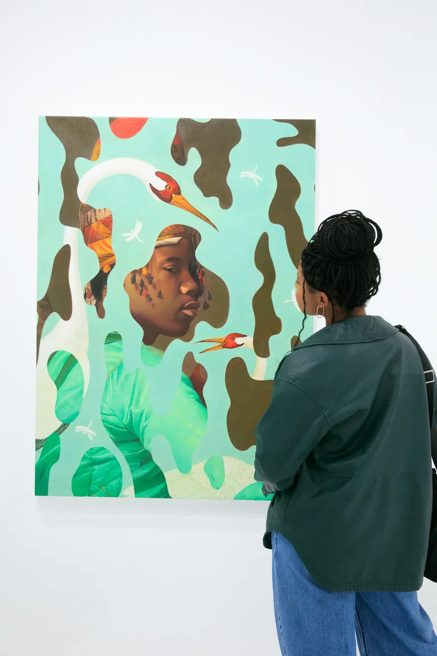 Guests at the opening reception for Dan Alva's "Something Out of Nothing" & Kenny Scharf's "Woodz 'N Thingz" presentation