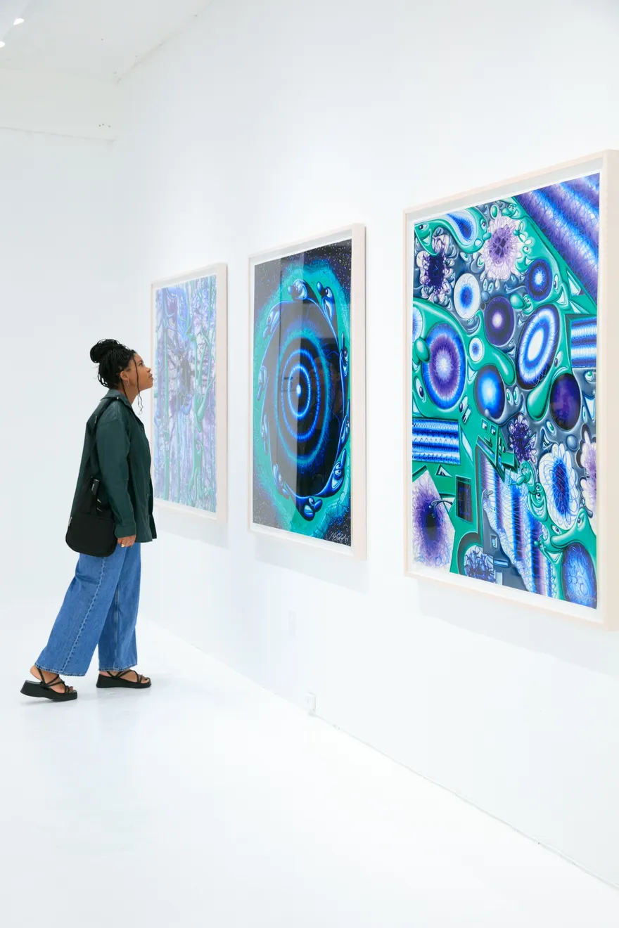 Guests at the opening reception for Dan Alva's "Something Out of Nothing" & Kenny Scharf's "Woodz 'N Thingz" presentation