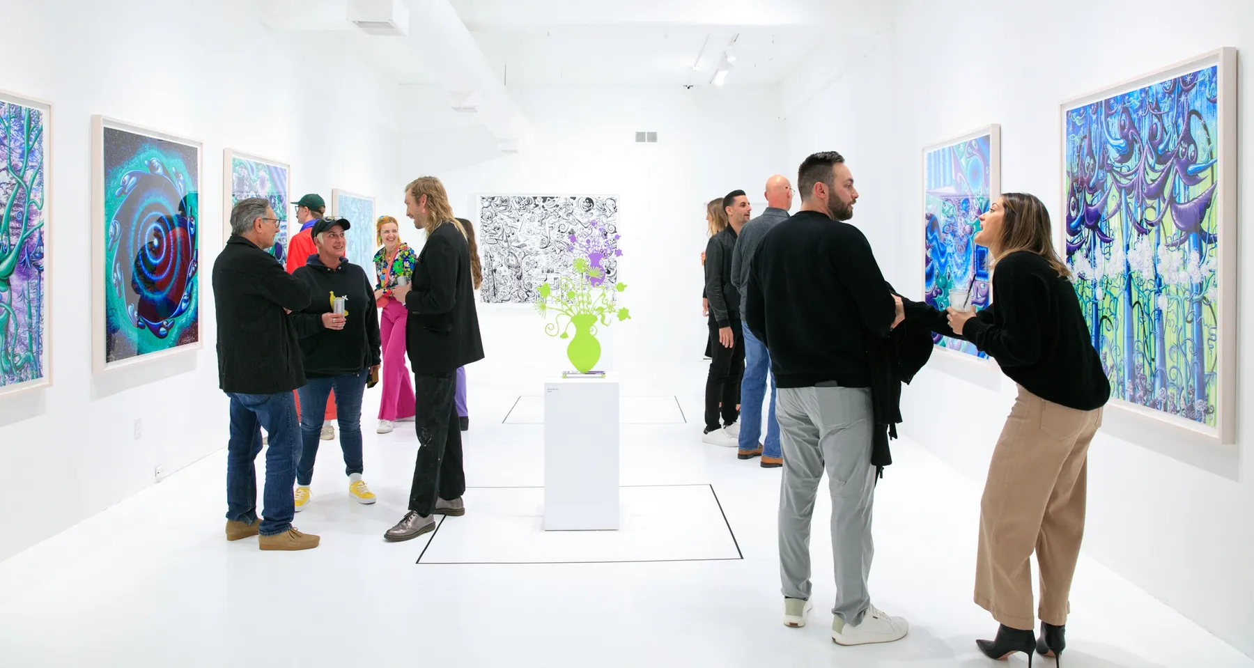 Guests at the opening reception for Dan Alva's "Something Out of Nothing" & Kenny Scharf's "Woodz 'N Thingz" presentation