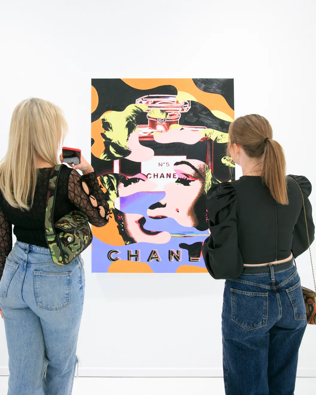 Guests at the opening reception for Dan Alva's "Something Out of Nothing" & Kenny Scharf's "Woodz 'N Thingz" presentation