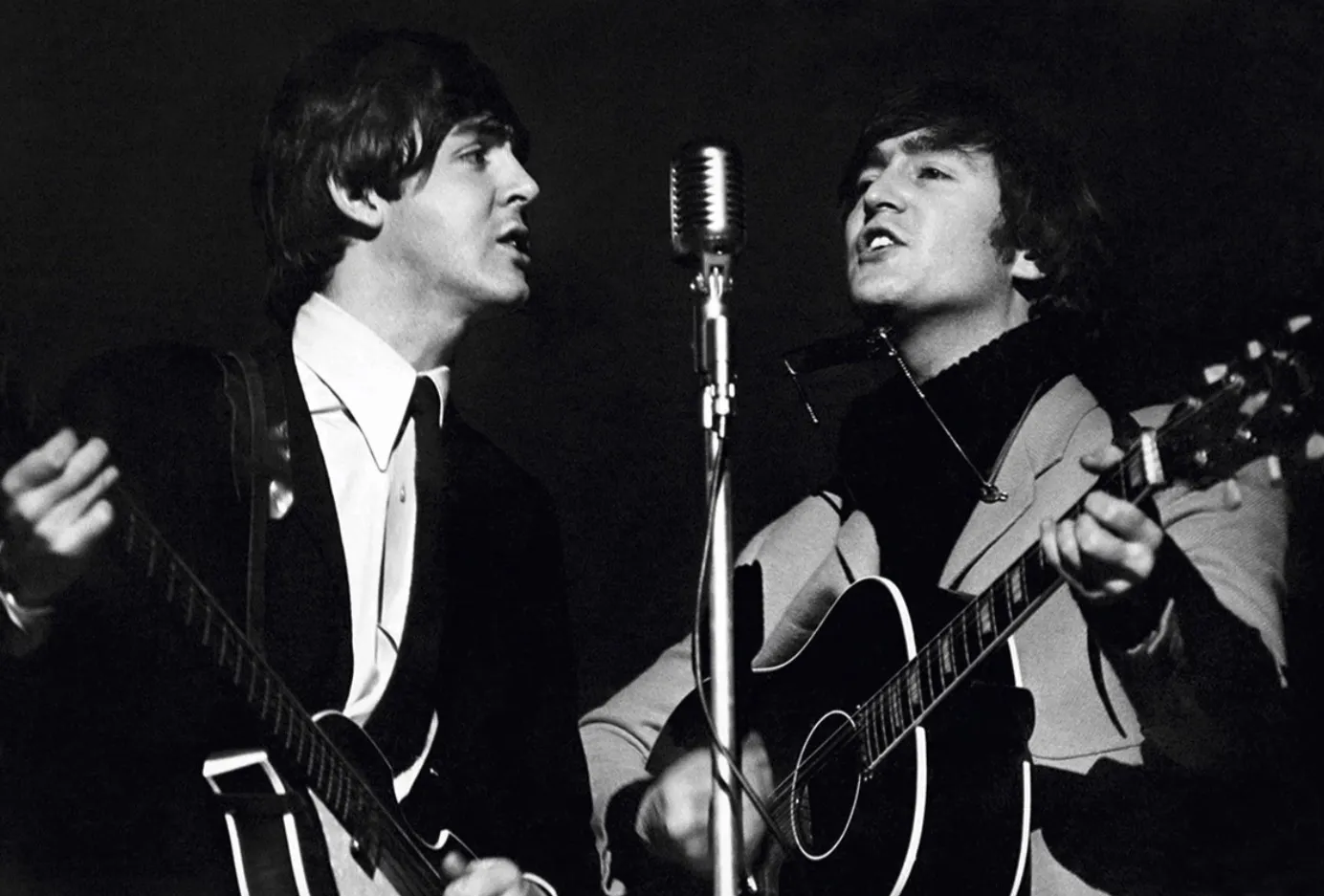 Terry O'Neill, THE BEATLES' PAUL MCCARTNEY AND JOHN LENNON AT WEMBLEY STUDIOS (POSTHUMOUS) , 1964