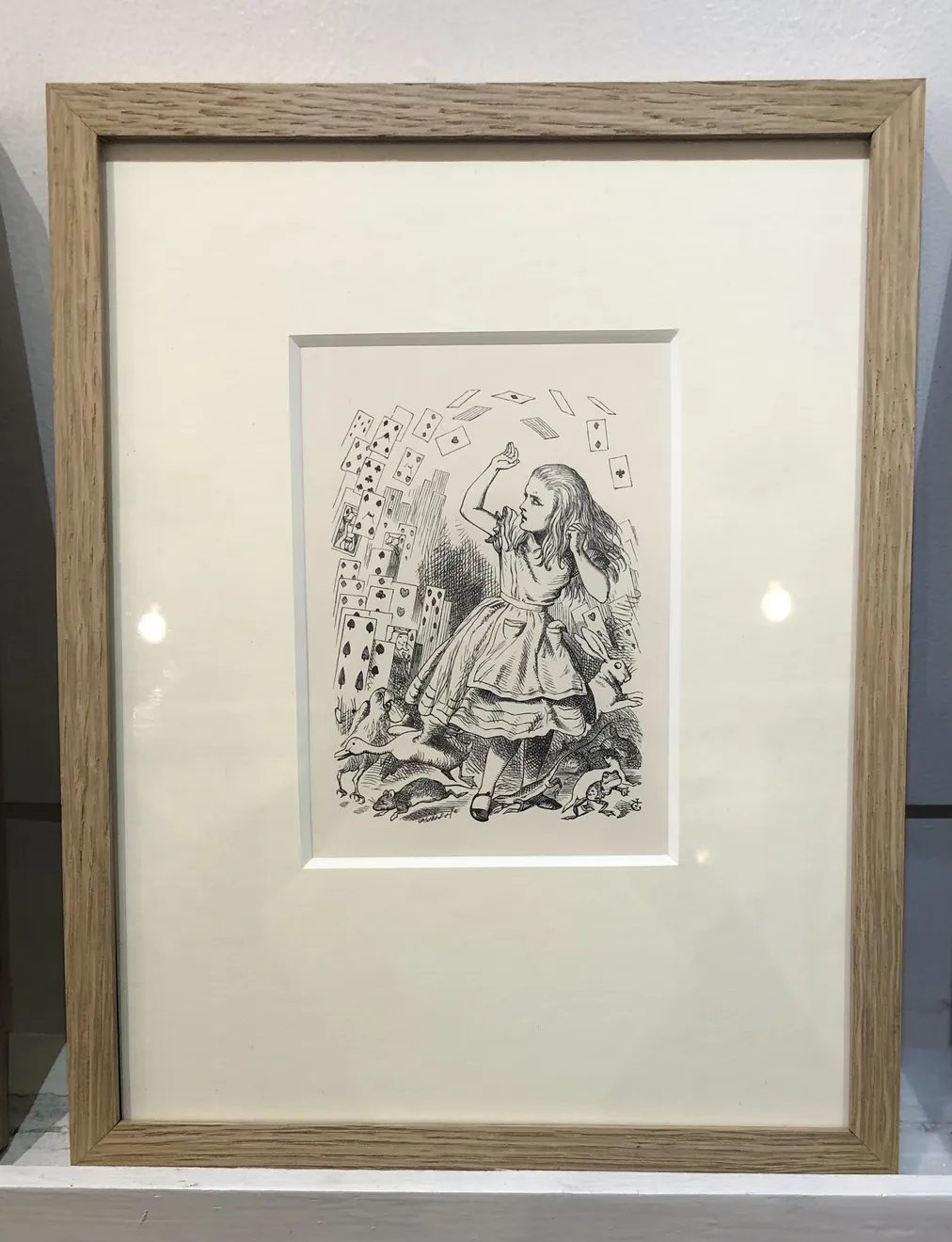 John Tenniel, At this the whole pack rose up into the air, and came flying down upon her...