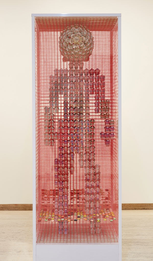 Title: Australian warhead with rising tide of human rights abuses Medium: Origami shirts folded from world currencies on cotton thread Dimensions: 223 x 121 x 77 cm