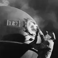 Dalhouse Cleans Headlight, Close Up