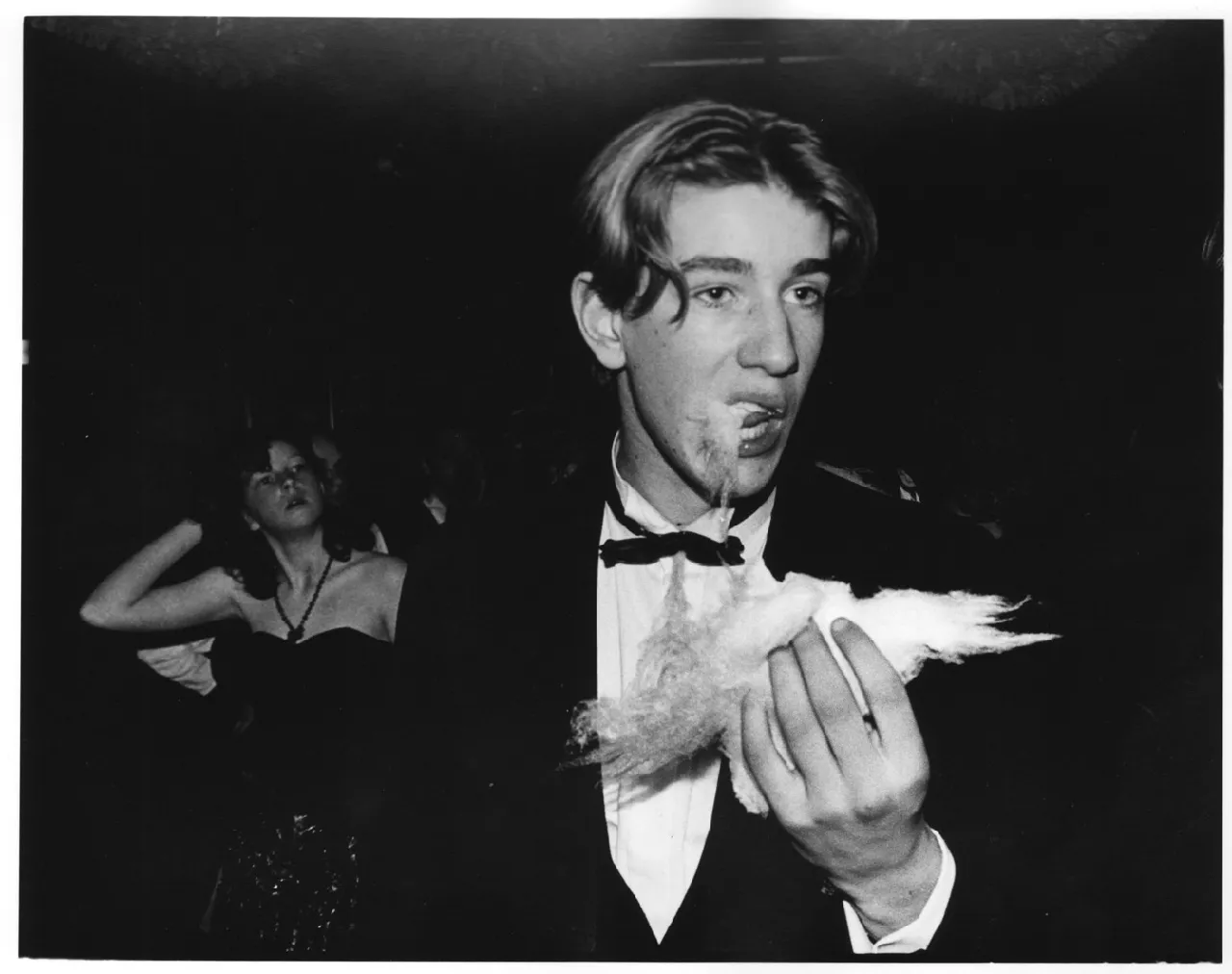 Dafydd Jones, Teenage Balls Toby Russell eating candy floss, Feather Ball. Hammersmith Palais,, 1988