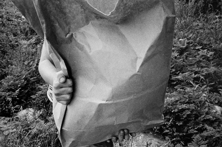 Mark Cohen, Boy Behind Big Bag, 1974