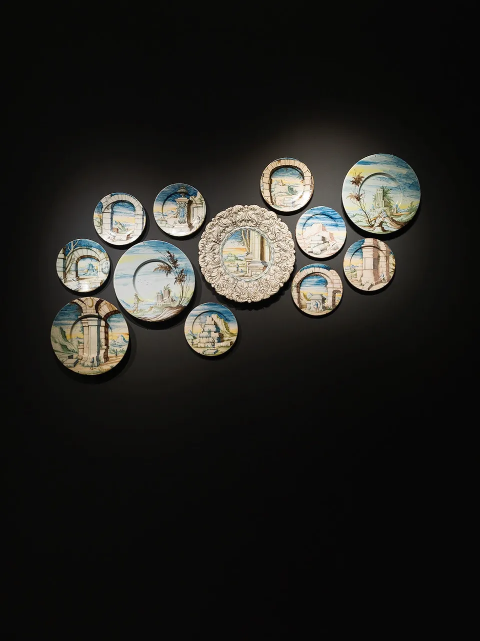 SIRO ANTONIO AFRICA OR SIRO DOMENICO AFRICA, A Series of Signed Small Plates and Two Large Dishes “Con Archittetura Dell’Africa”, c. 1700