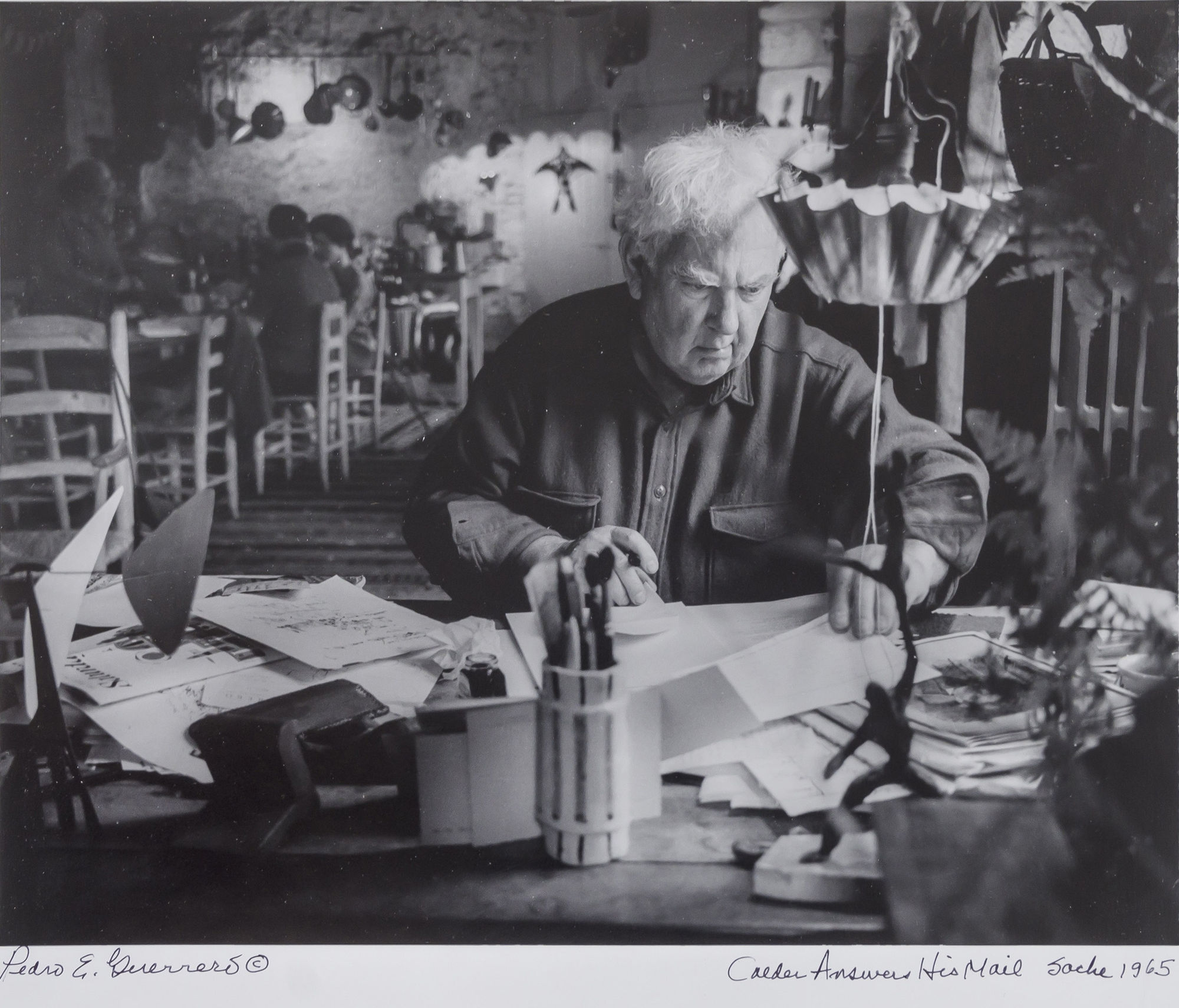 Pedro E. Guerrero, Alexander Calder Answers his Mail, Saché, France, 1965