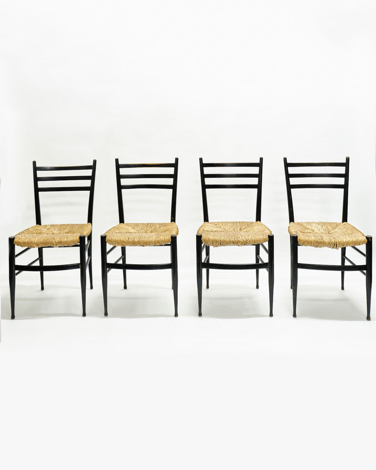 Gio Ponti, Set of 8 'Superleggera' style ladder back dining chairs