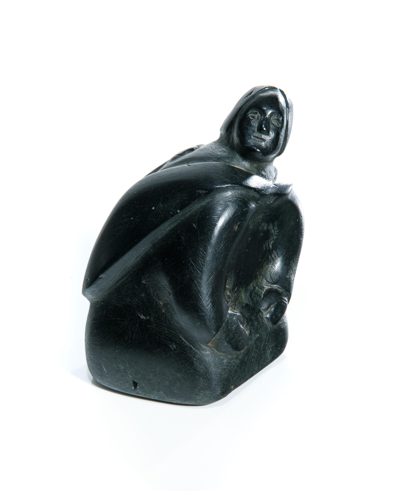 YVONNE KANAYUQ ARNAKYUINAK (1920-1988) QAMANI'TUAQ (BAKER LAKE) Joyful Mother with Child in her Amaut, early 1980s stone, 4.5 x 3.5 x 3 in (11.4 x 8.9 x 7.6 cm) $1,250