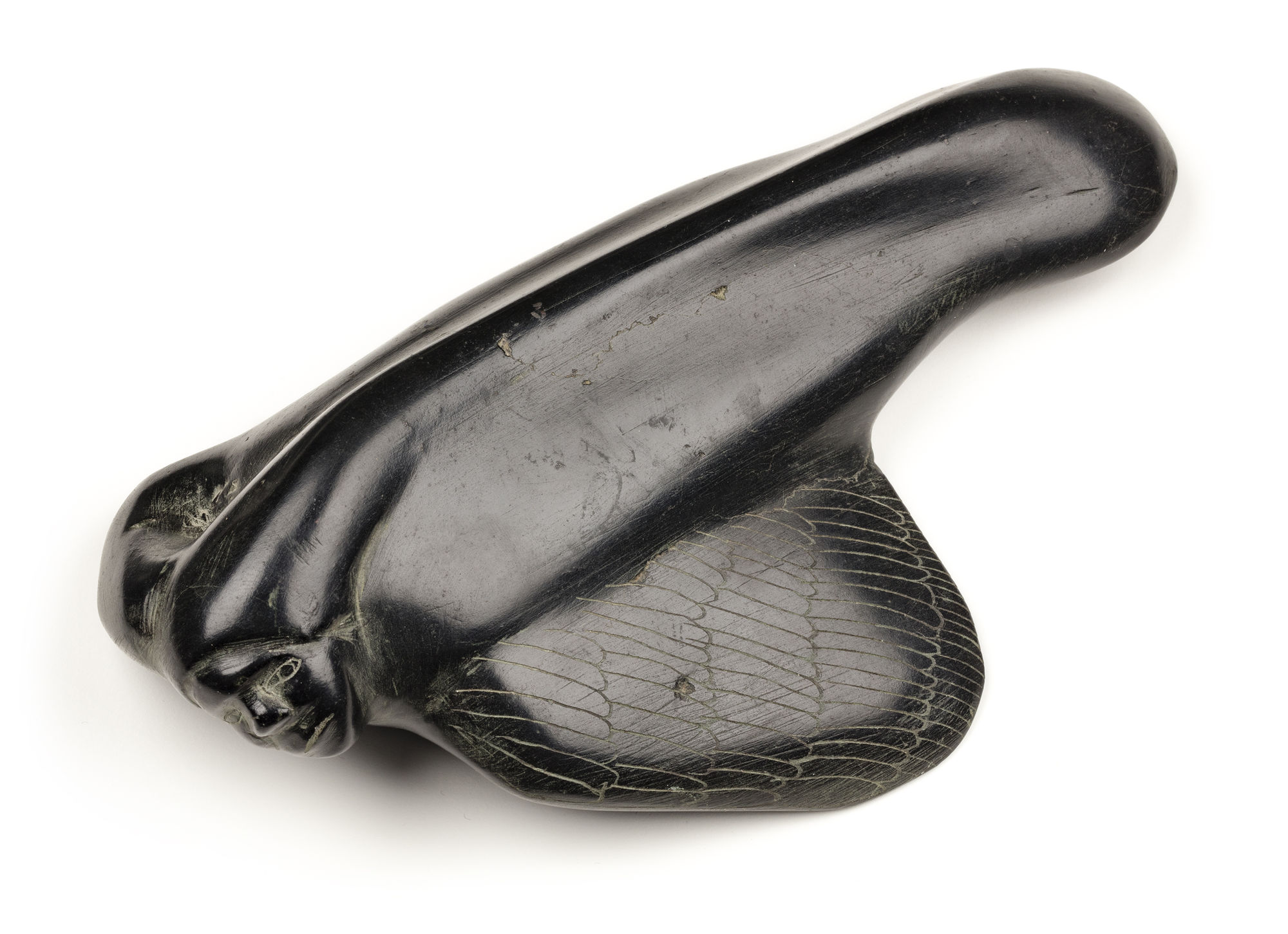 BARNABUS ARNASUNGAAQ (1924-2017) QAMANI'TUAQ (BAKER LAKE) The Flight of the Shaman, 1979 stone, 2.25 x 9.5 x 5.5 in (5.7 x 24.1 x 14 cm) $2,750