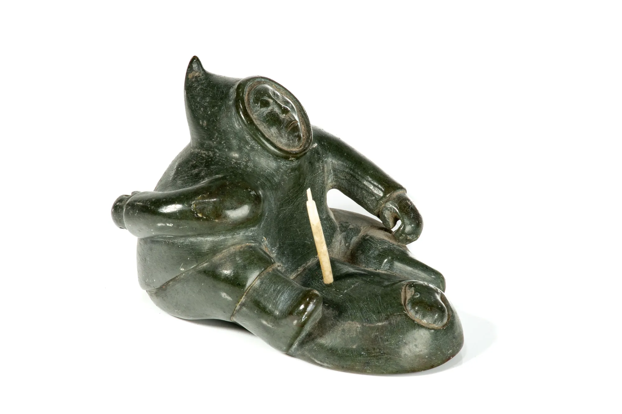 ABRAHAM NASTAPOKA (1900-1981) INUKJUAK (PORT HARRISON) Hunter at a Seal Hole, c. 1960 stone, ivory, and waxed string, 3.5 x 3 x 4.25 in (8.9 x 7.6 x 10.8 cm) $850