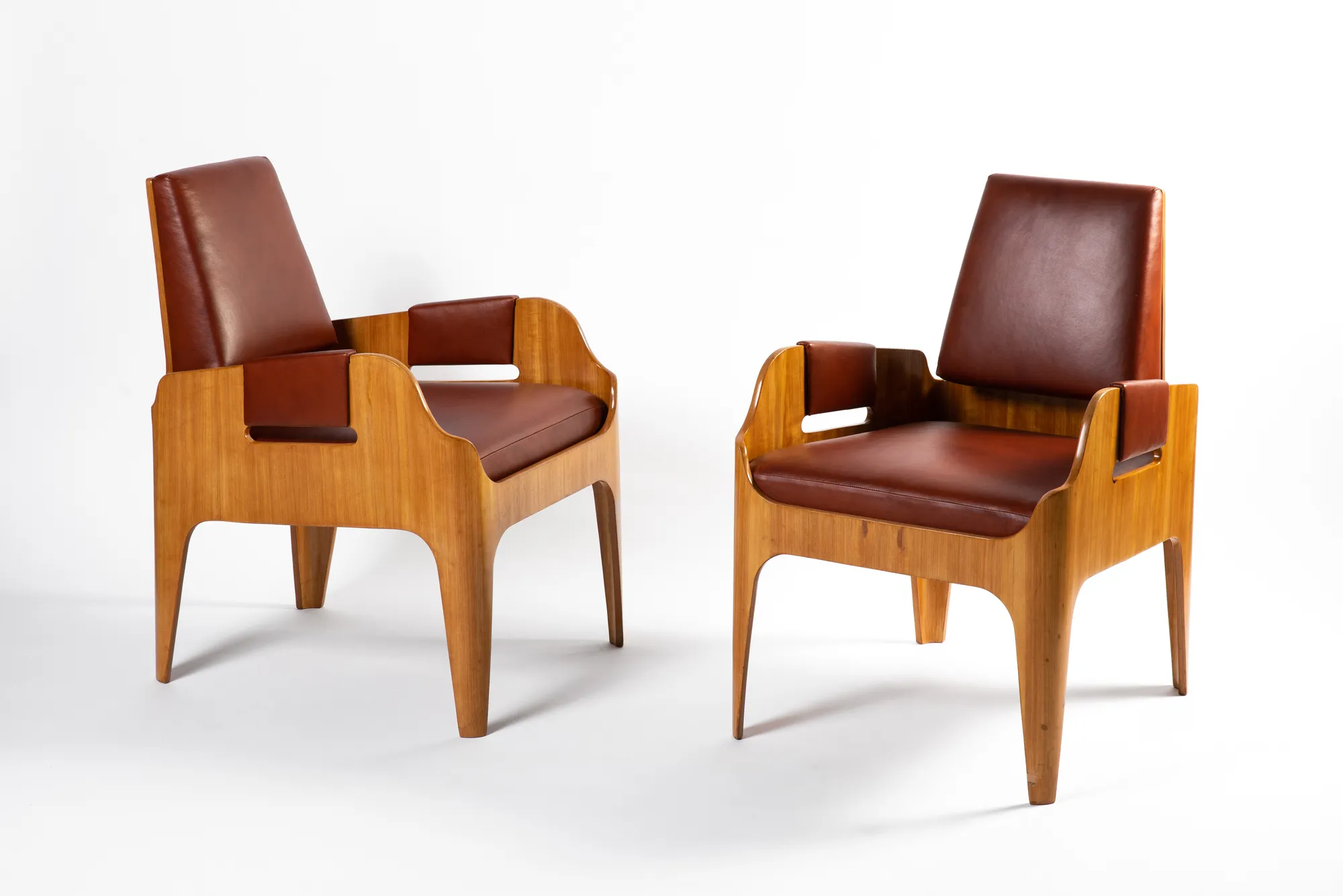 John Lloyd Wright, "SS Canberra" pair of armchairs, c. 1960