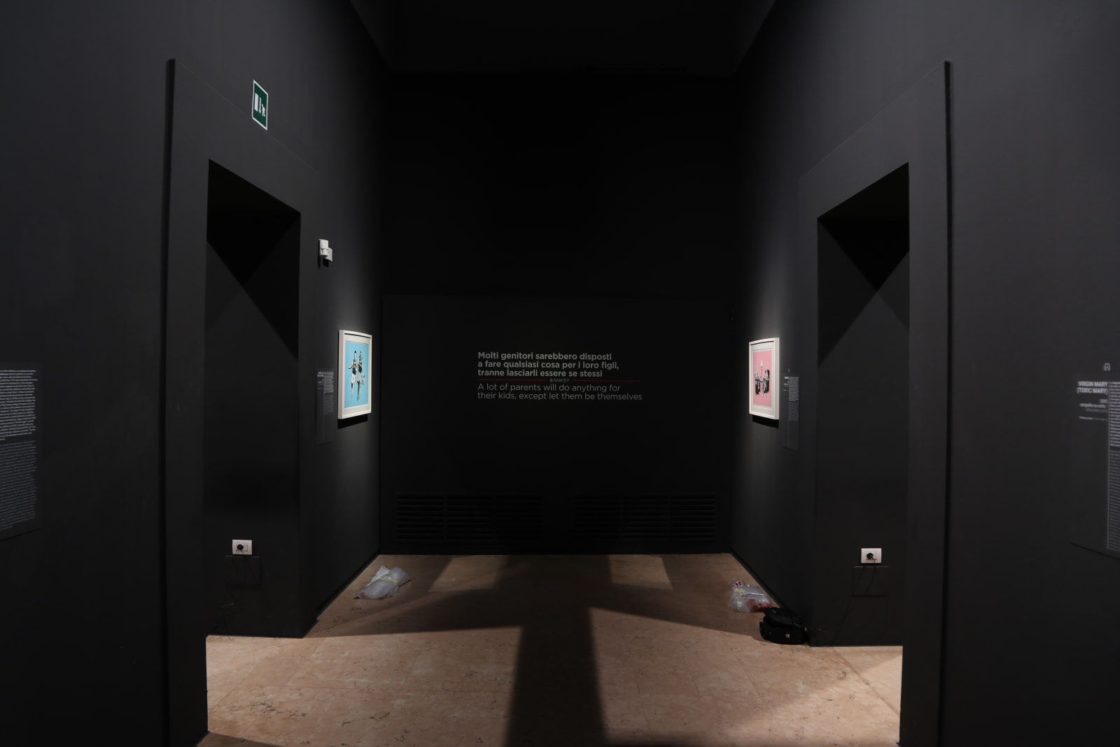 Banksy artwork hanging on wall