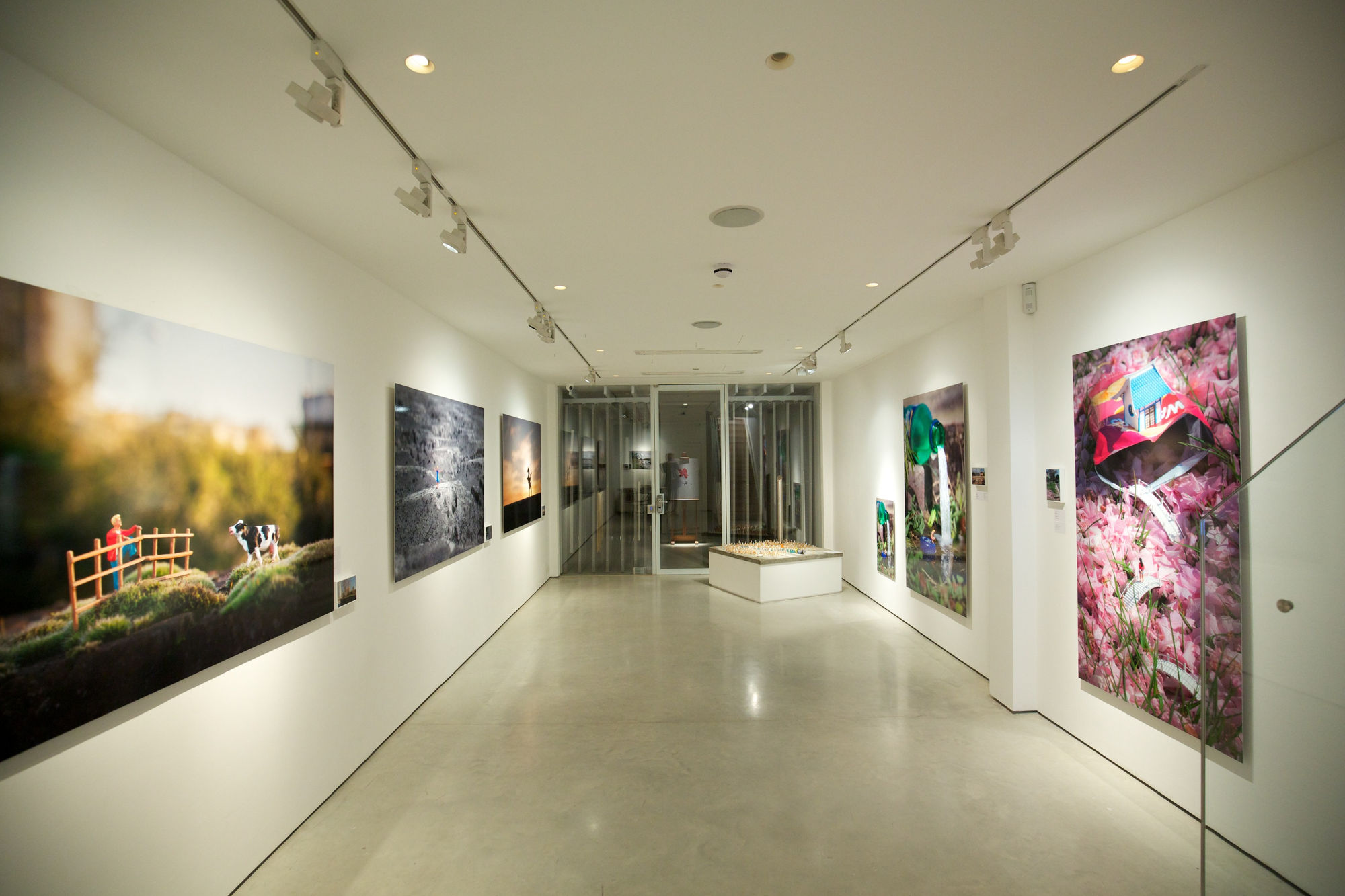 Slinkachu print hanging in exhibition at andipa gallery.