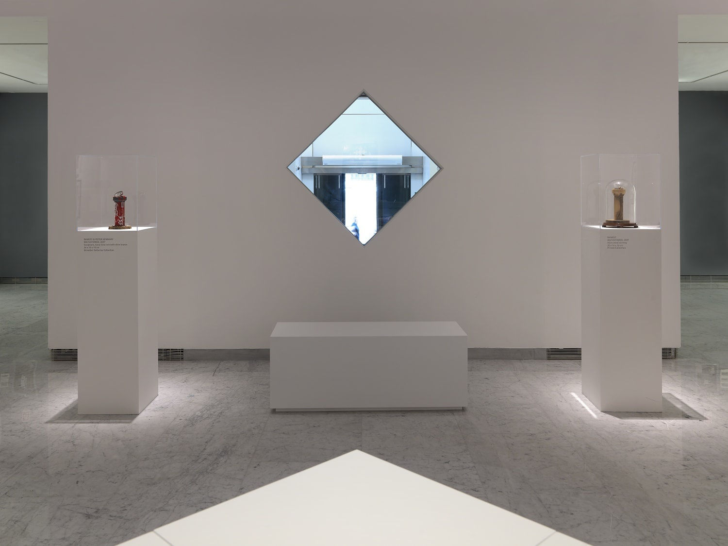 Banksy Exhibition installation, Prints hanging on the walls.