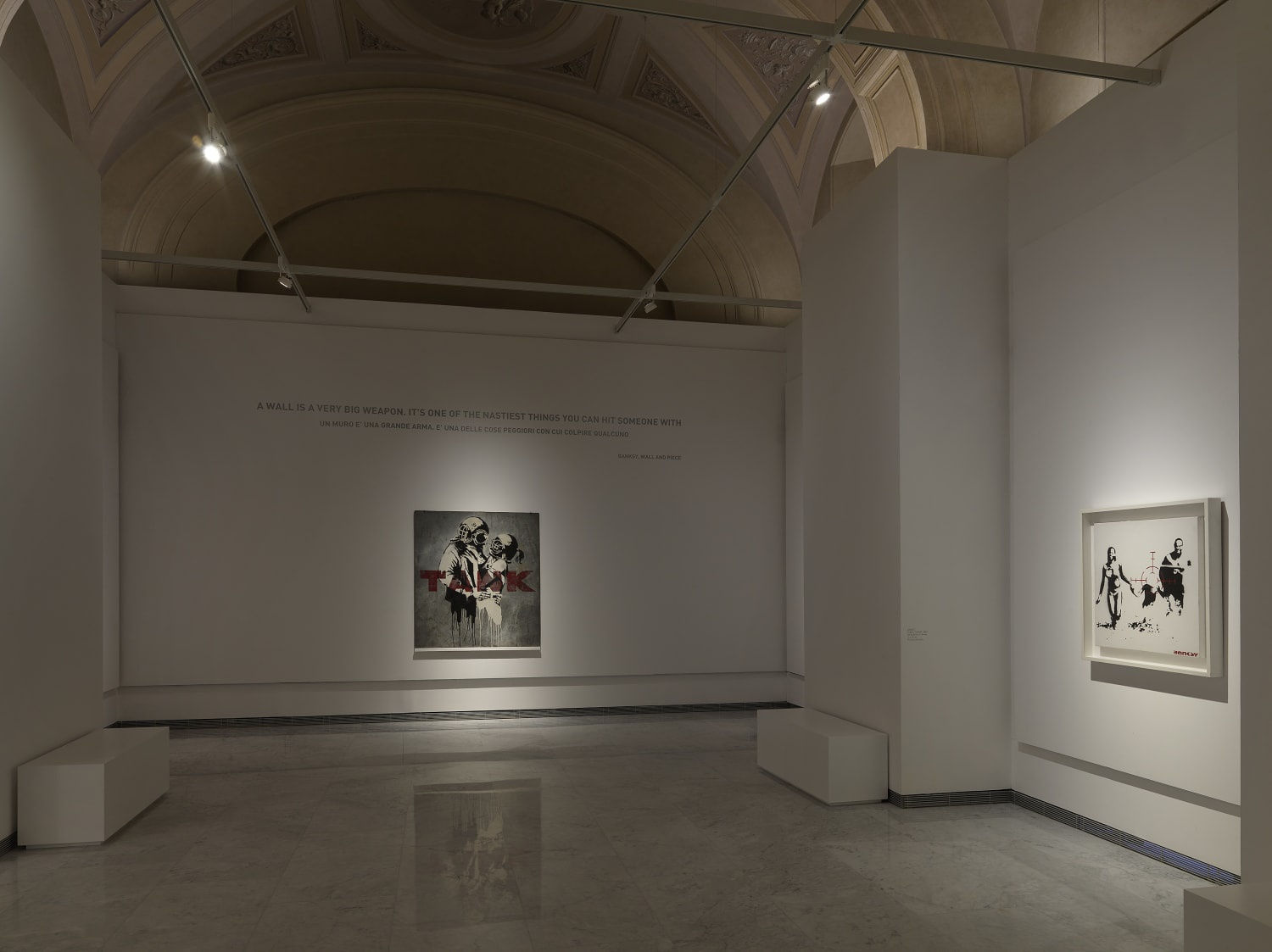 Banksy Exhibition installation, Prints hanging on the walls.