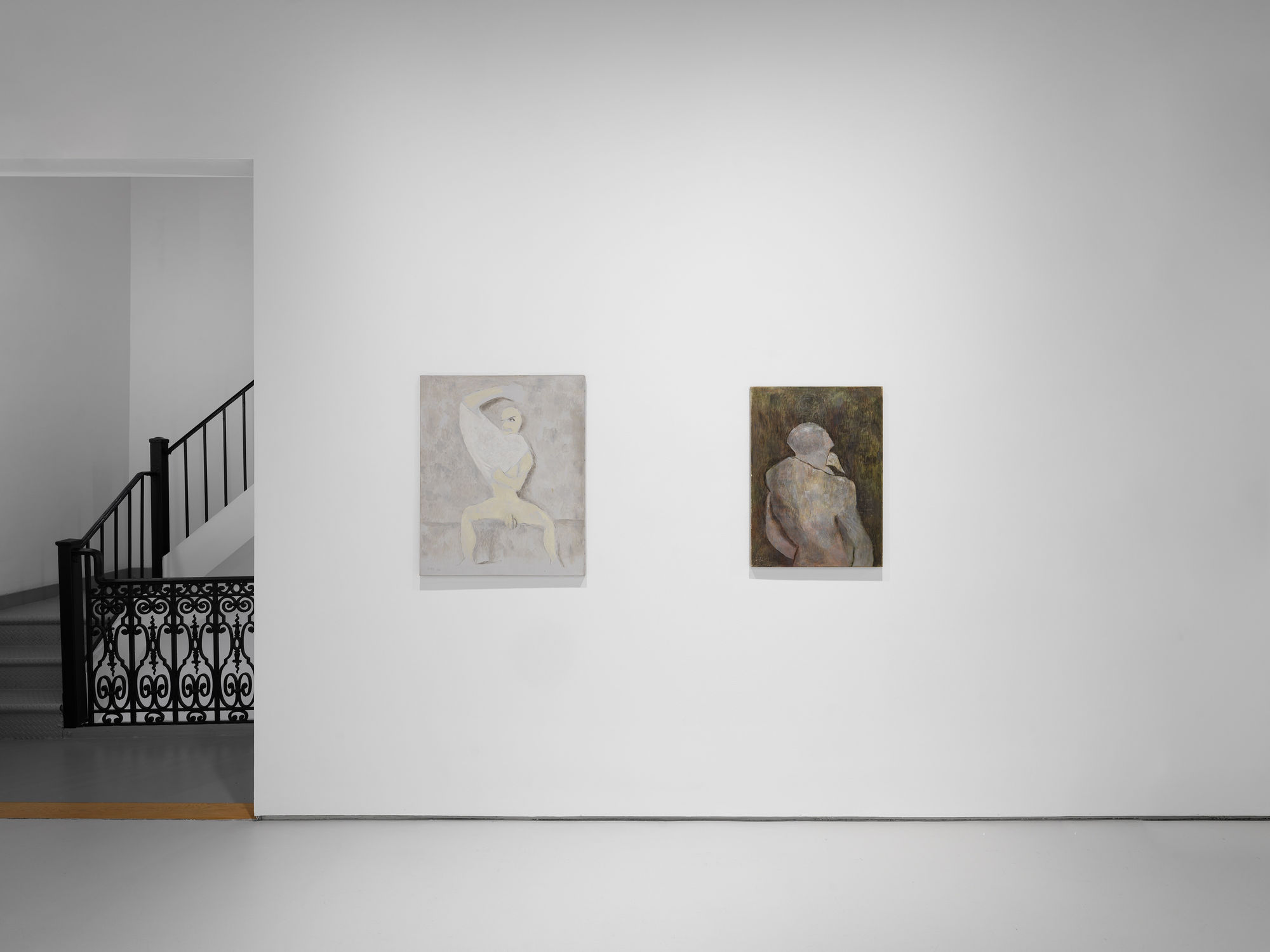 Installation view of David Byrd's exhibition on the first and second floors of the gallery. Two of Byrd's more abstract, figurative works harmonize in this shot. Man in Gray and Yellow and White along with Old Man are shown.