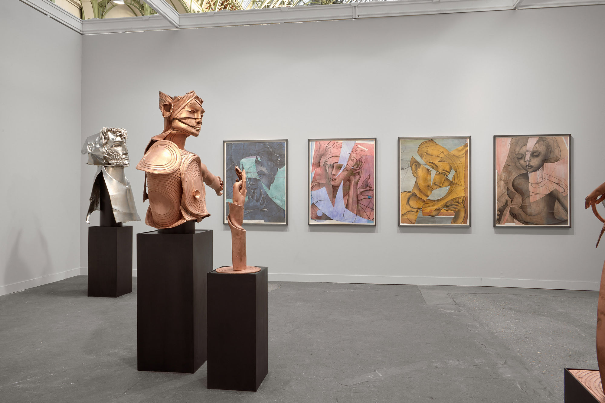 Matthew Monahan solo booth at FIAC filled with a variety of sculptures and paintings.
