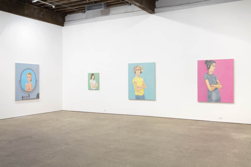 Installation view of Brian Calvin's fourth show at Anton Kern Gallery, featuring a group of paintings of faces, lips, mouths, poses, and a mirror. Some additional works.