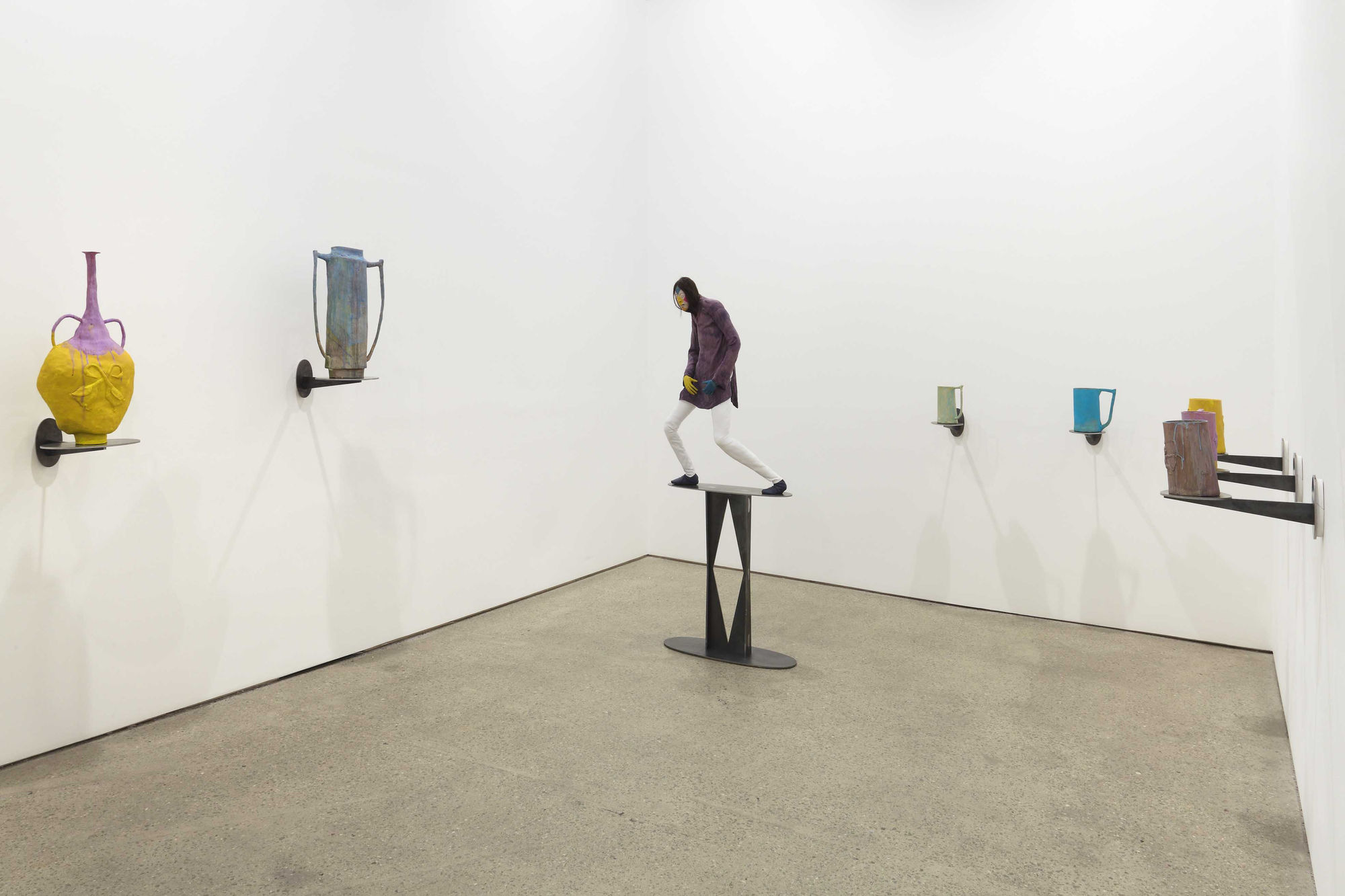 Installation view of Francis Upritchard's debut New York gallery show, featuring figurative and ritualistic sculptures as well as a collection of pots. An additional photo of the back room.