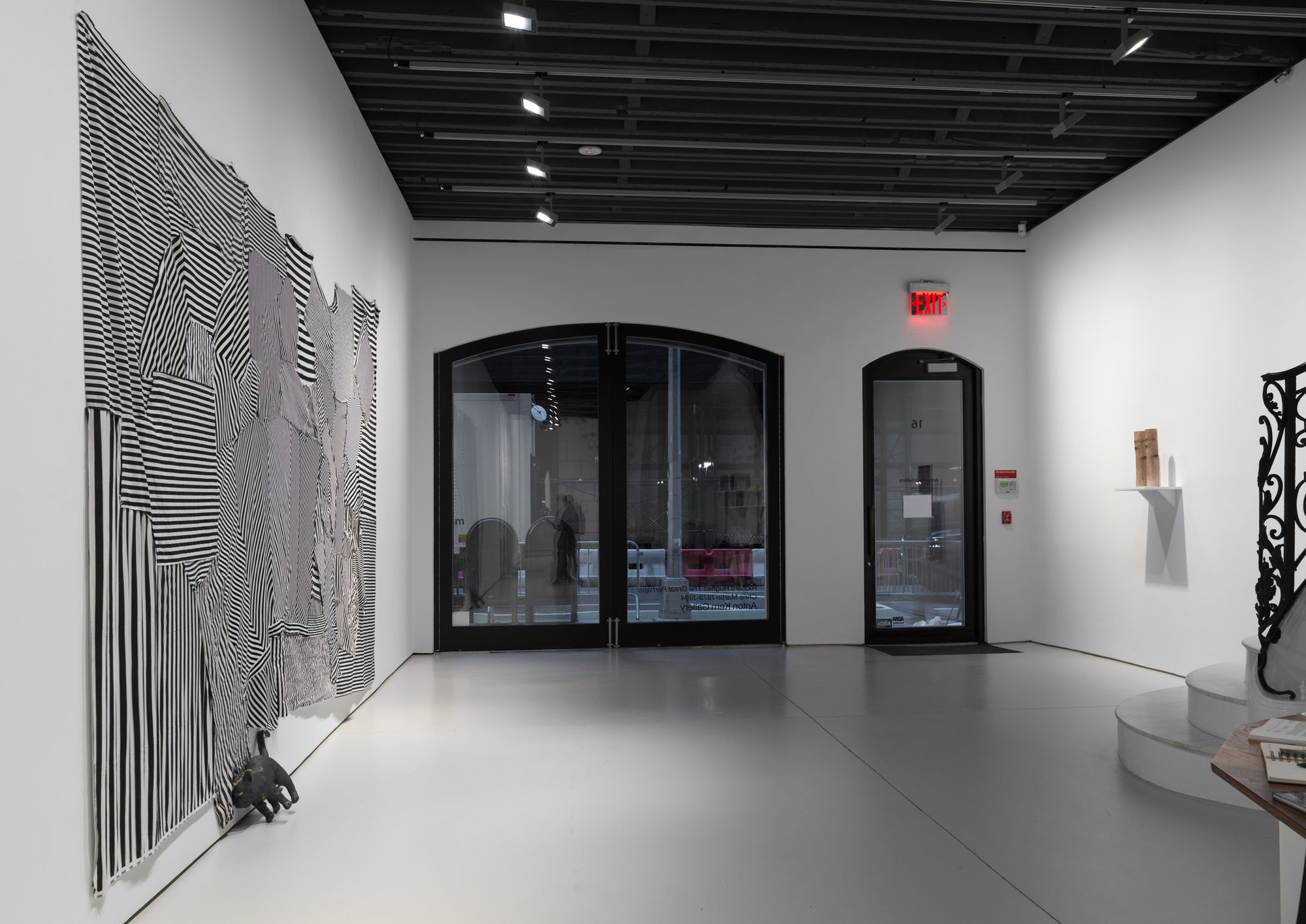 Installation views of the many sculptural works in Richard Hughes' solo exhibition at the gallery. One of Hughes' fabric works at the front of the gallery.