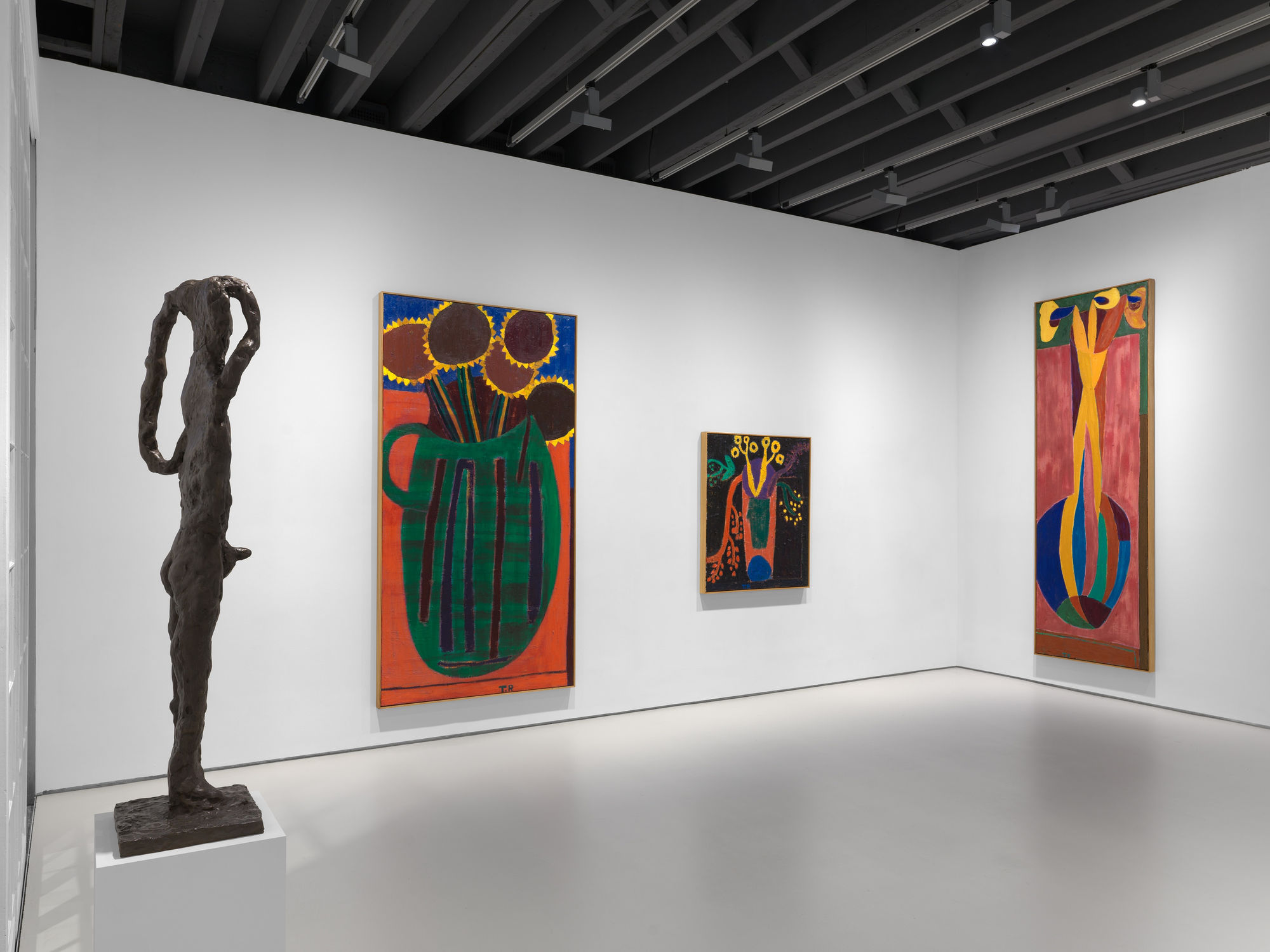 Installation view of Tal R's first exhibition with the gallery featuring paintings and sculptures. Three painted works and a sculpture featured.