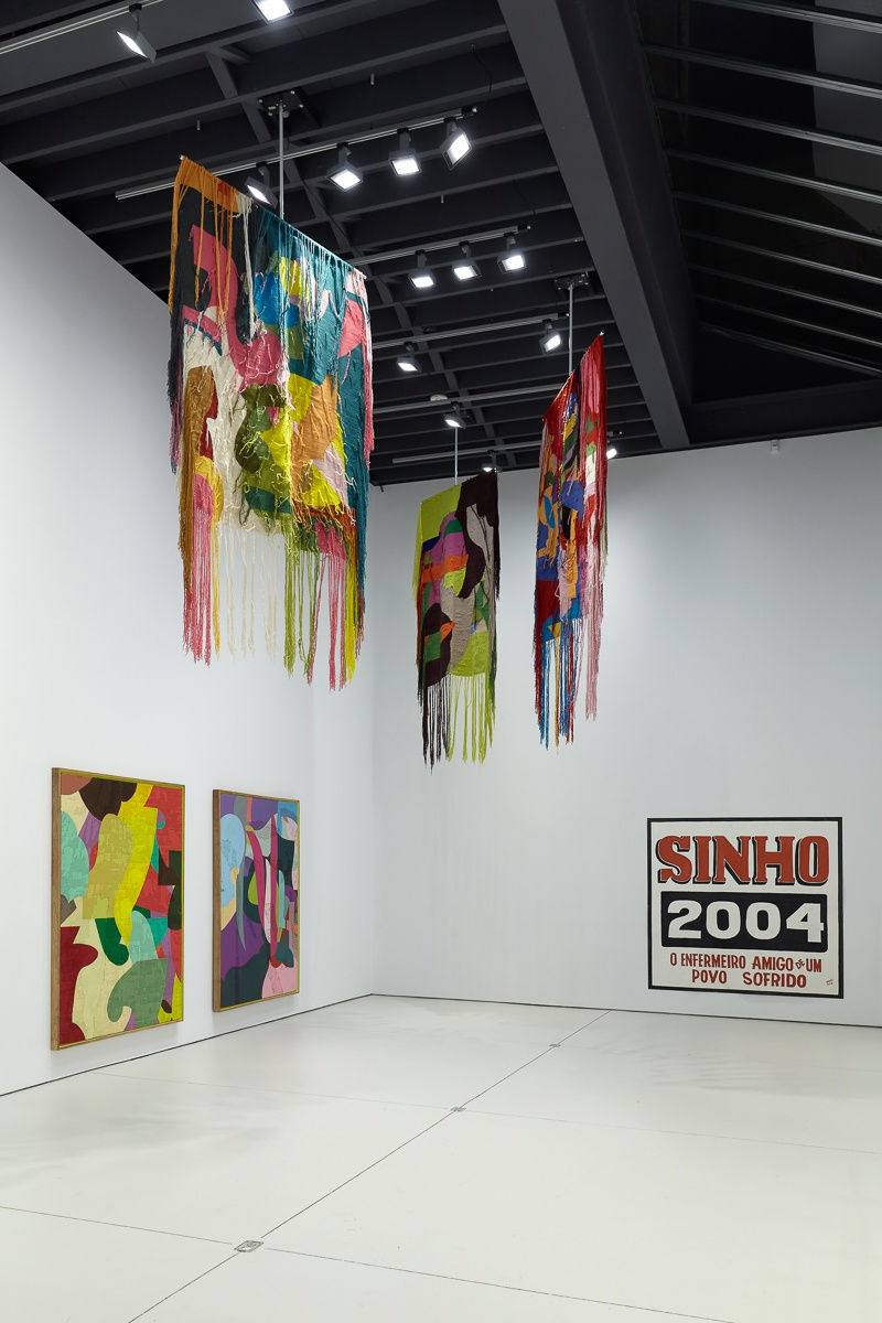 installation view of group show 'Samba in the Dark'. A few acrylic works as well as two tapestries shown here.