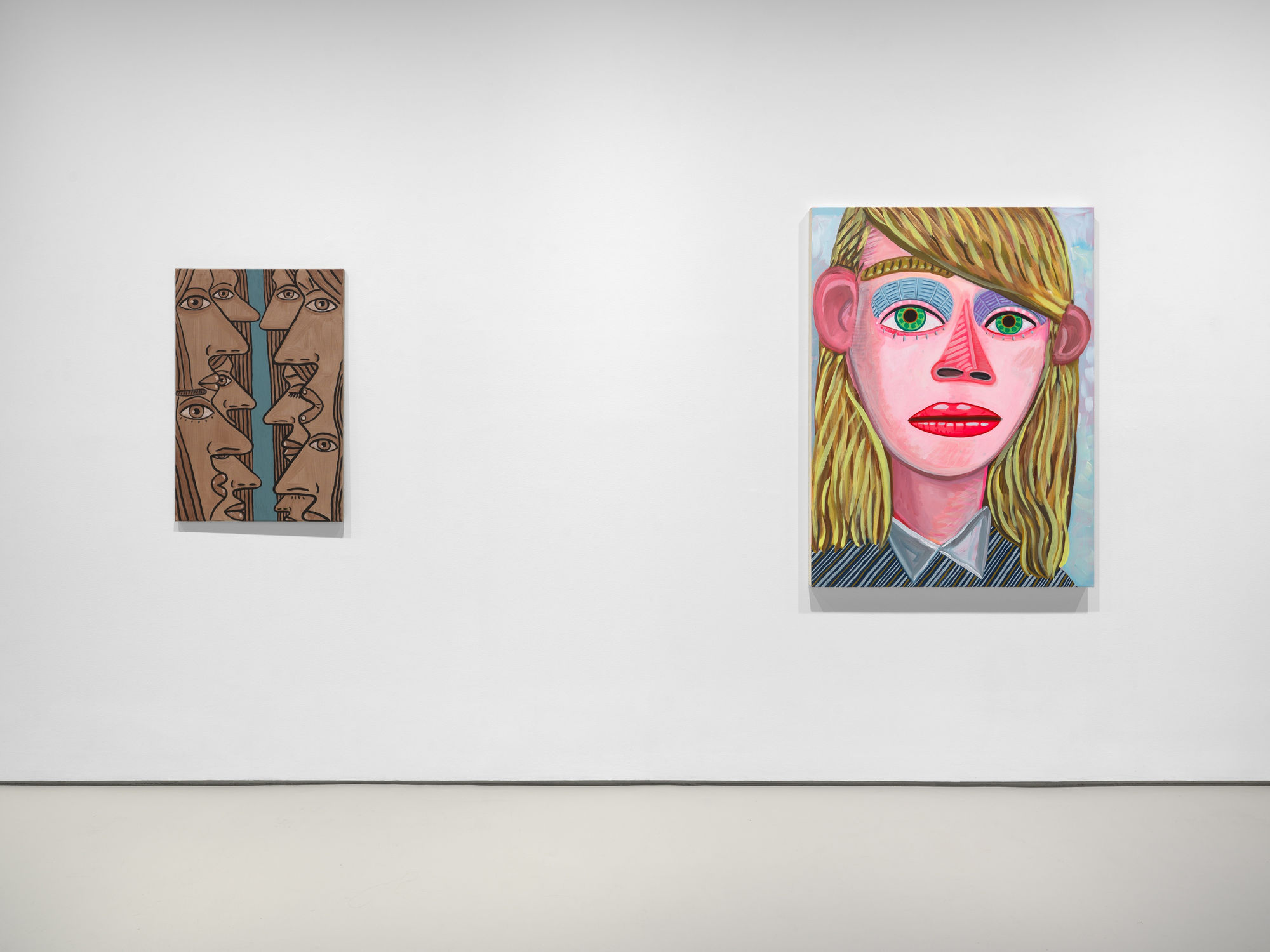 installation view of Brian Calvin's Waiting featuring paintings with hyperbolic color, mosaic eyes, and more. Two works presented in this shot.
